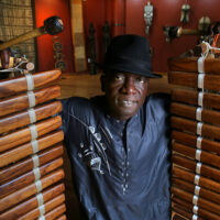 Worcester - 10/03/19 -  Musical director Balla Kouyaté (cq), a recent recipient of the prestigious NEA Heritage Fellowship award, with his balafon in the headquarters of Crocodile River Music in Worcester.  He was honored as a balafon player (West African xylophone) and as a "djeli," which refers to the oral historians, musicians, and performers who keep alive and celebrate the history of the Mandé people of West Africa.  (Lane Turner/Globe Staff) Reporter:  (Sean Murphy)  Topic: (09consumerprime)